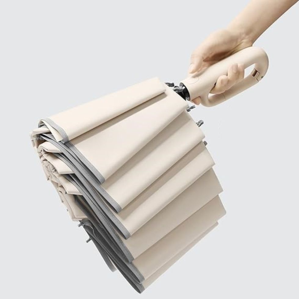 PARAGUAS PLEGABLE CON GANCHO PORTÁTIL